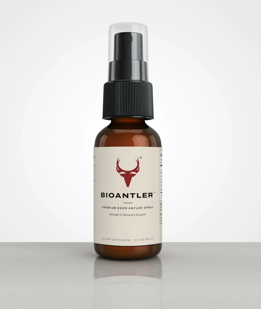 BIOANTLER deer antler spray in the new bone label: amber glass bottle with black sprayer, oxblood stag mark